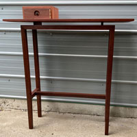 Hall table in jarrah with silver ash drawer and ebony details